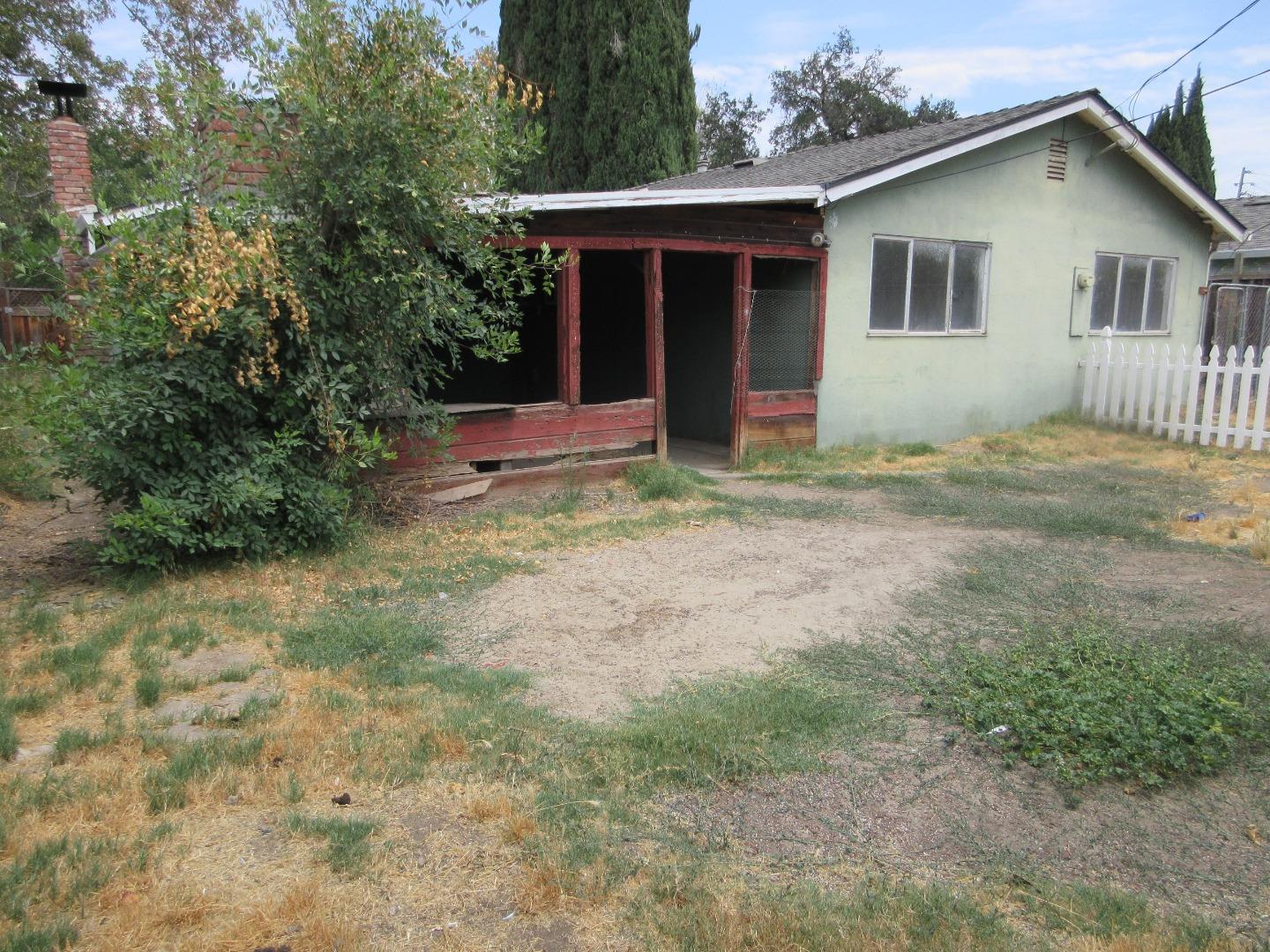 696 Coyote Road San Jose, CA 95111 - Photo 17 of 18 a view of a house with a yard