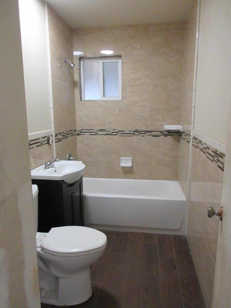 696 Coyote Road San Jose, CA 95111 - Photo 8 of 18 a bathroom with a sink a toilet and shower