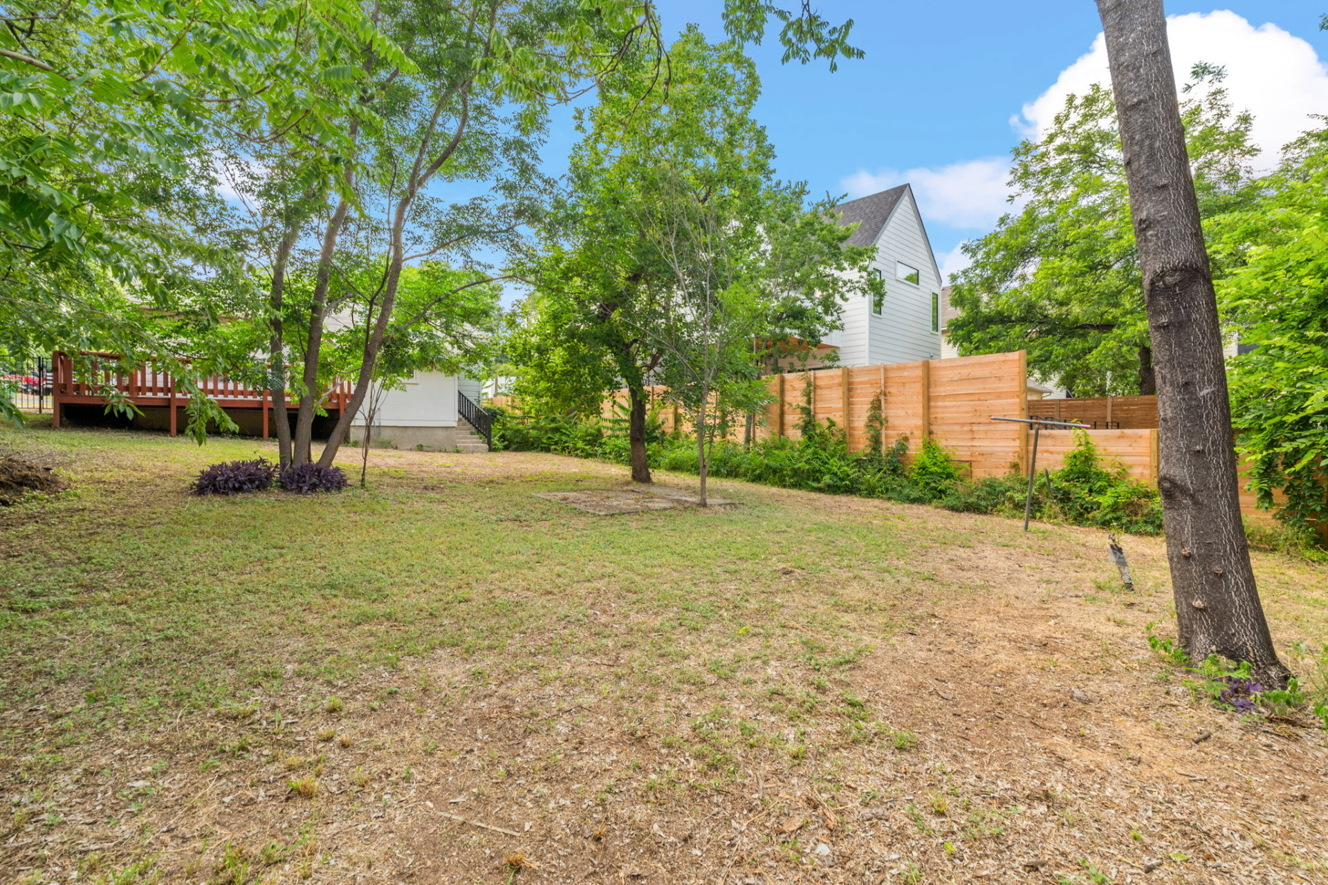 1303 Walnut Avenue Austin, TX 78702 - Photo 11 of 12 a view of a tree in front of a house