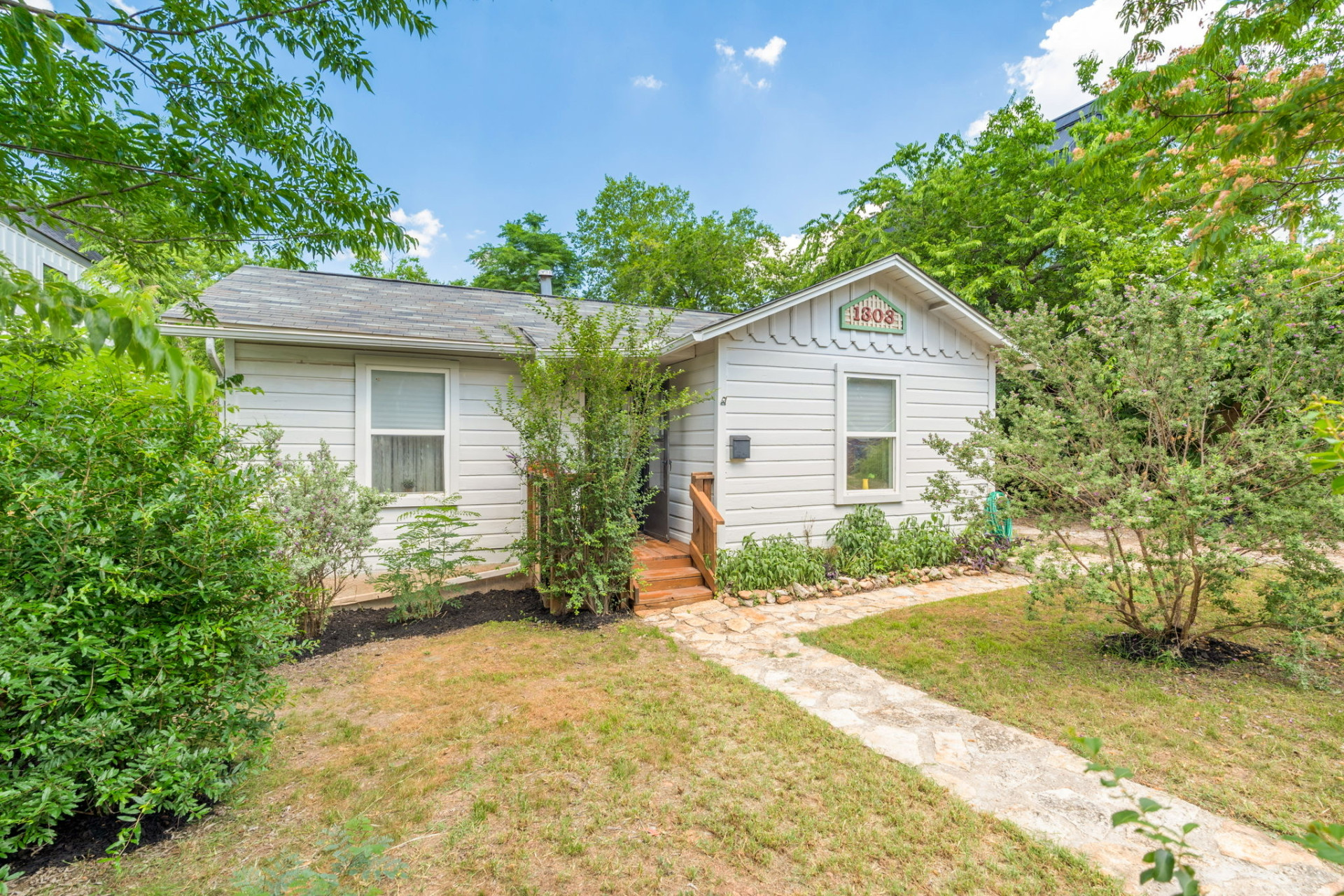 1303 Walnut Avenue Austin, TX 78702 - Photo 12 of 12 a view of backyard of house with green space