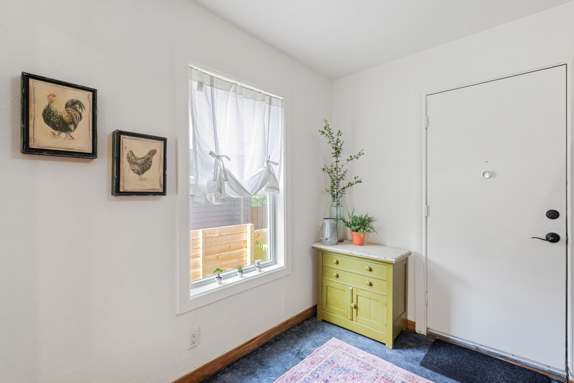 1303 Walnut Avenue Austin, TX 78702 - Photo 5 of 12 a view of room with window and wooden floor