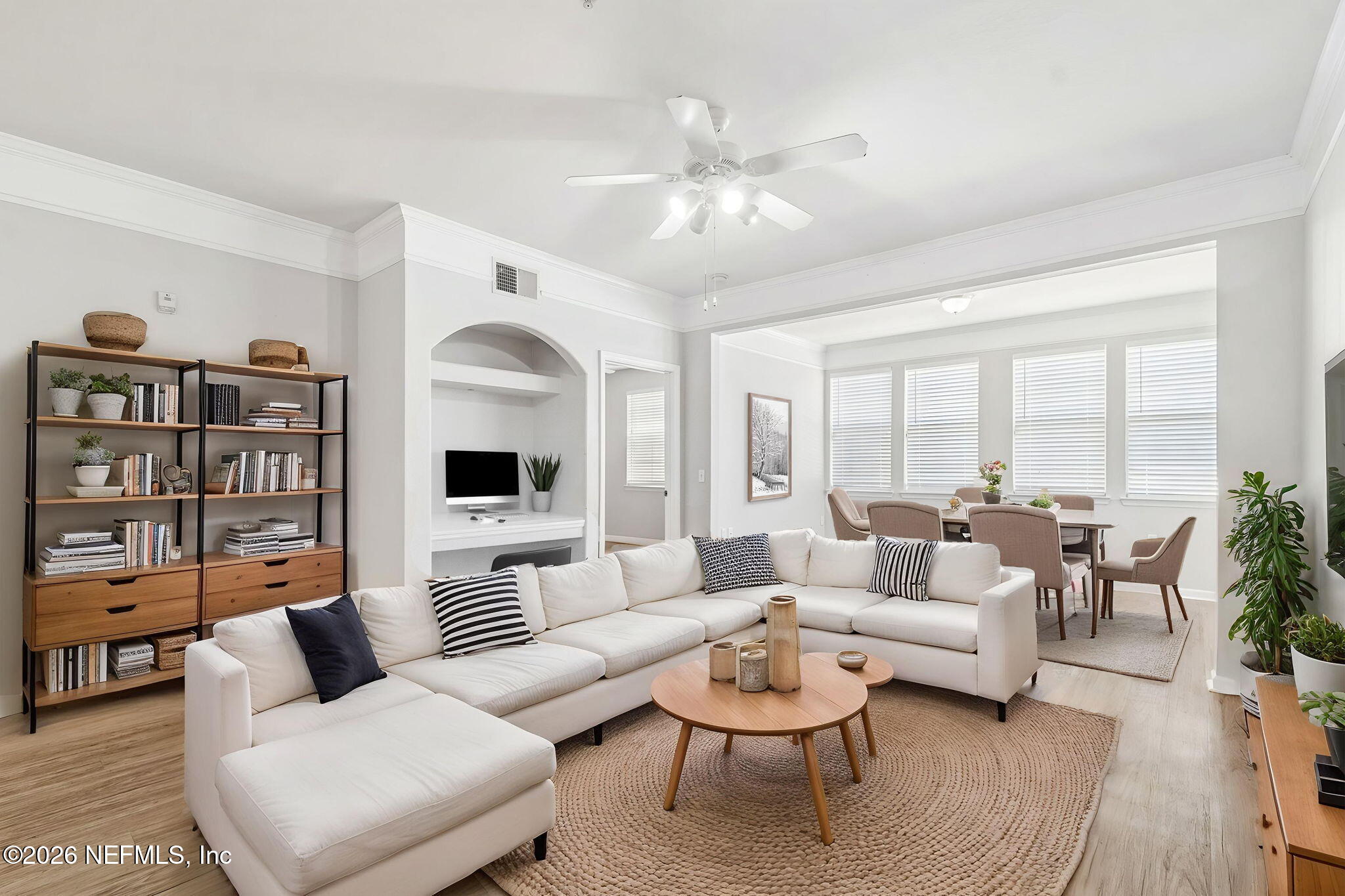 8550 Touchton Road, Unit 511 Jacksonville, FL 32216 - Photo 26 of 63 a living room with furniture or outdoor view and a large window