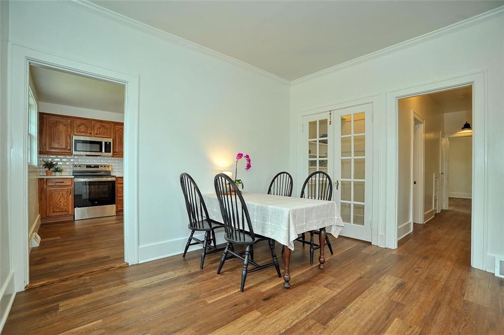 113 3rd Street Houston, PA 15342 - Photo 12 of 27 a view of a dining room with furniture and wooden floor