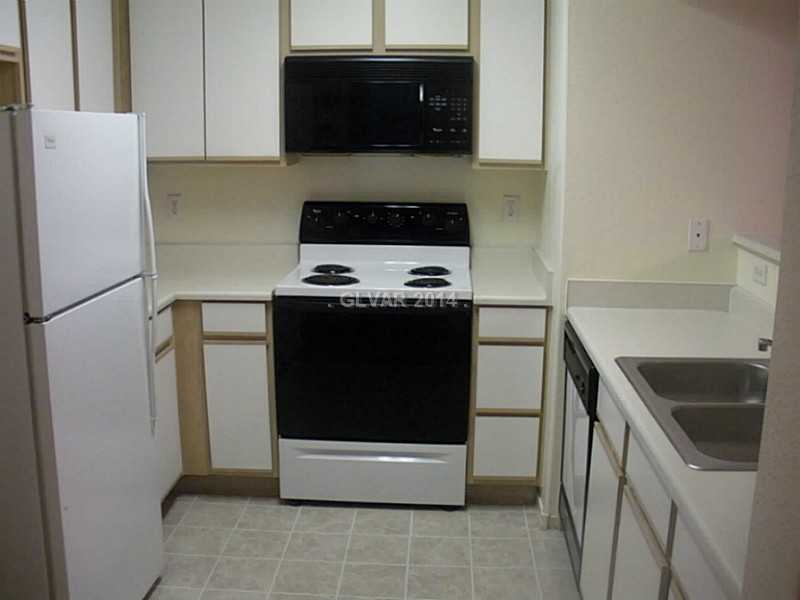 2300 East Silverado Ranch Boulevard, Unit 2133 Las Vegas, NV 89123 - Photo 7 of 11 Kitchen.