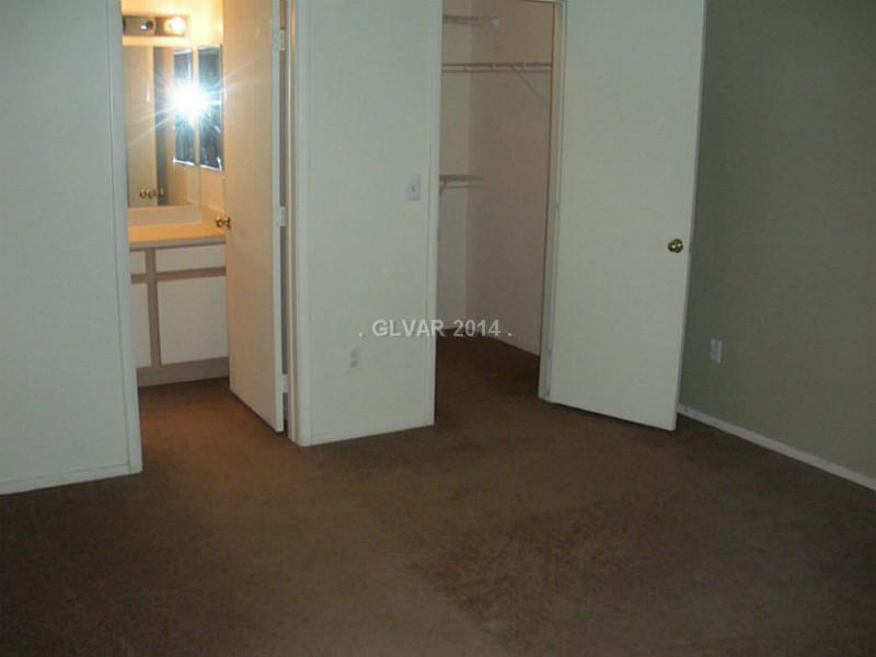 2300 East Silverado Ranch Boulevard, Unit 2133 Las Vegas, NV 89123 - Photo 9 of 11 Guest Bedroom.