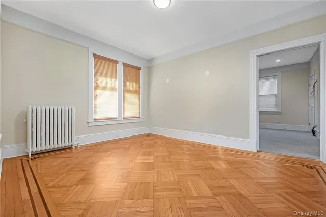 a view of an empty room and window
