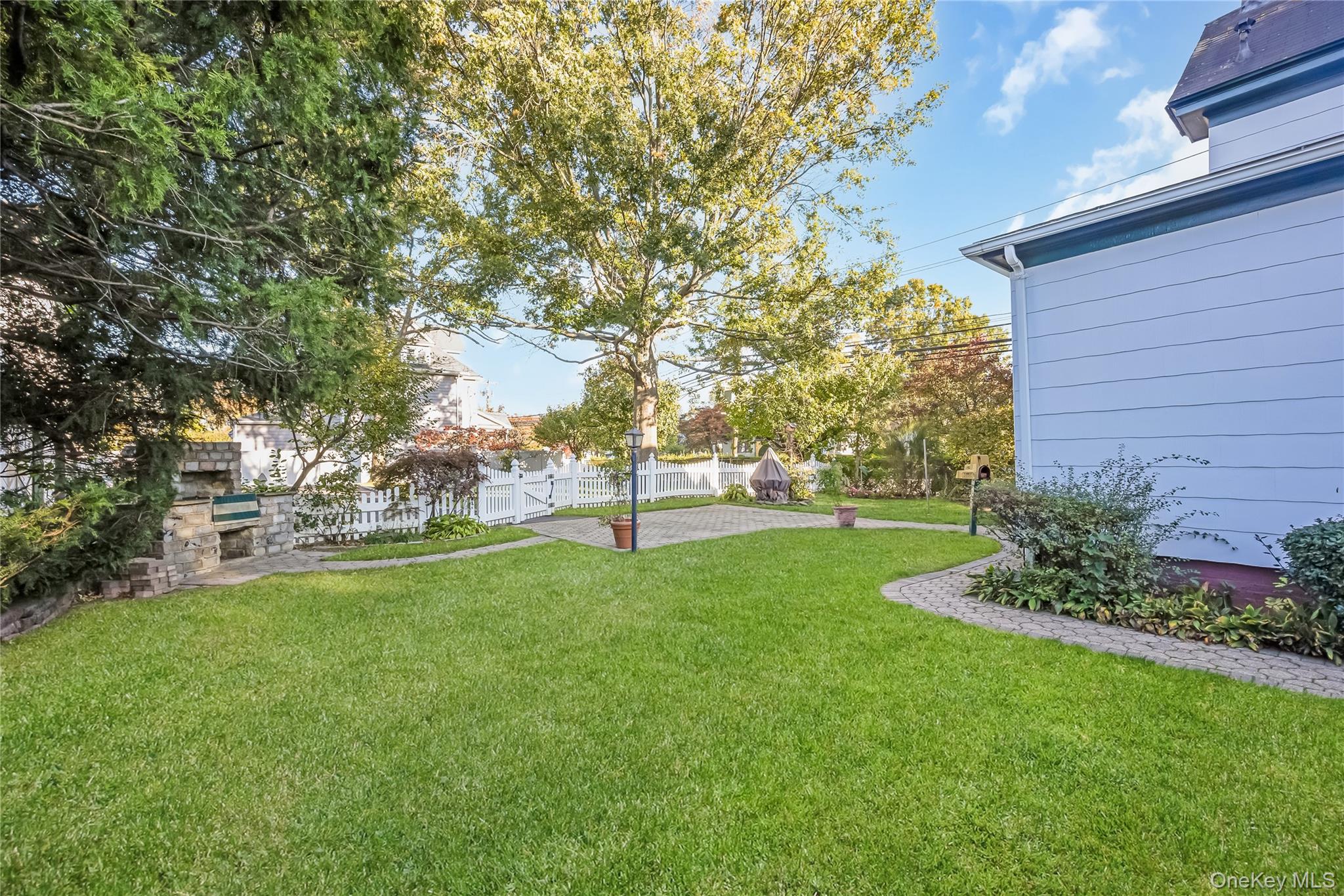 215 Conklin Street Farmingdale, NY 11735 - Photo 42 of 50 a view of a field of grass and trees