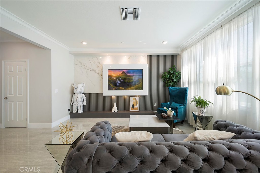 1663 Yarrow Place Upland, CA 91784 - Photo 1 of 1 a living room with furniture and a flat screen tv