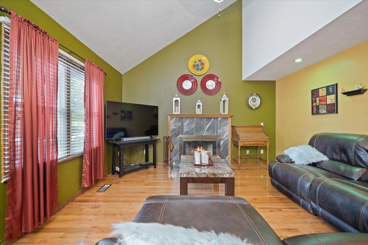 400 Park Pl Drive Normal, IL 61761 - Photo 13 of 33 a living room with furniture and a flat screen tv