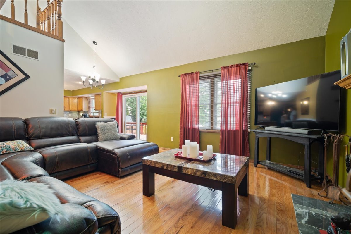 400 Park Pl Drive Normal, IL 61761 - Photo 14 of 33 a living room with furniture and a flat screen tv