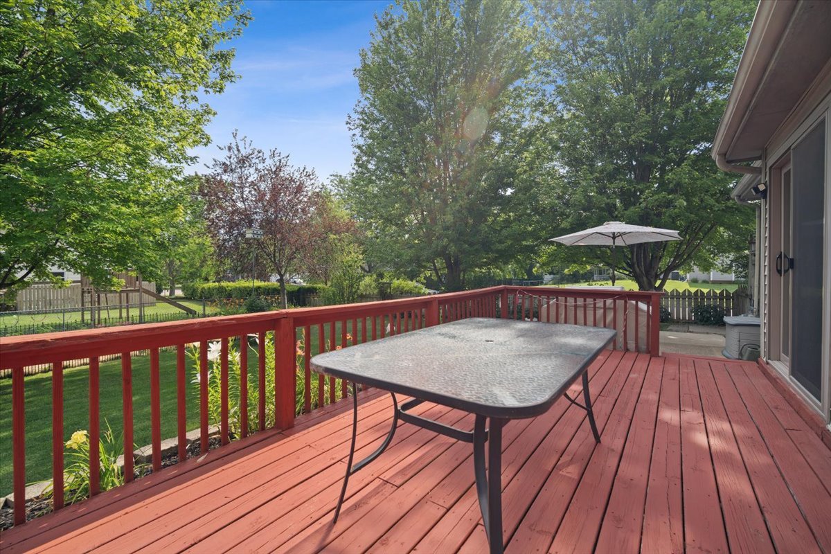 400 Park Pl Drive Normal, IL 61761 - Photo 29 of 33 a view of balcony with wooden floor and outdoor seating