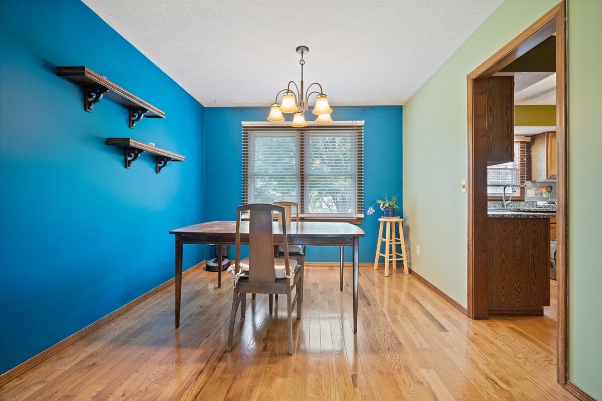 400 Park Pl Drive Normal, IL 61761 - Photo 6 of 33 a view of a dining room with furniture window and wooden floor