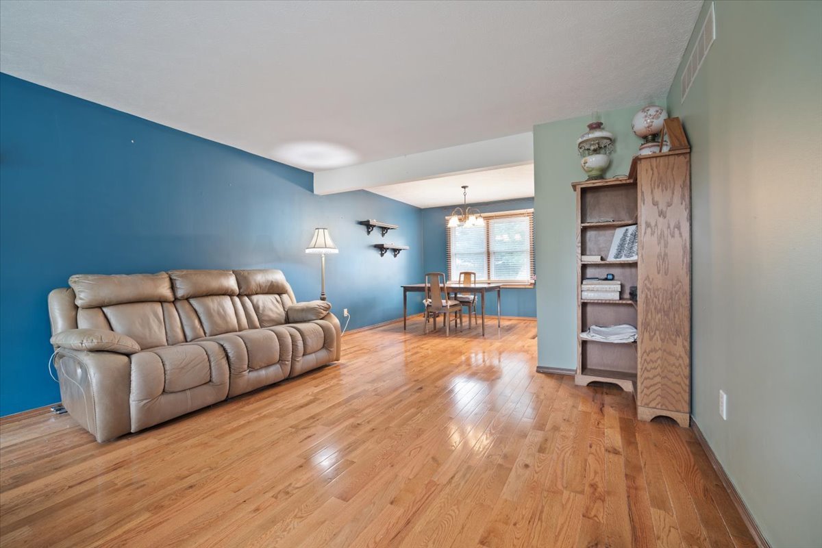 400 Park Pl Drive Normal, IL 61761 - Photo 8 of 33 a living room with furniture and a wooden floor