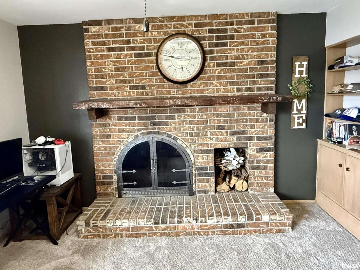 2003 19th Street Moline, IL 61265 - Photo 13 of 39 a view of a livingroom with furniture and a fireplace