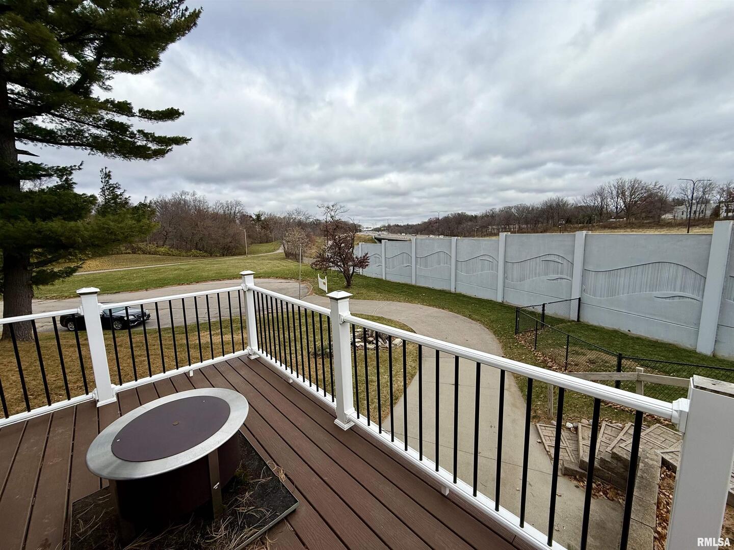 2003 19th Street Moline, IL 61265 - Photo 31 of 39 a view of a chair and table in the balcony