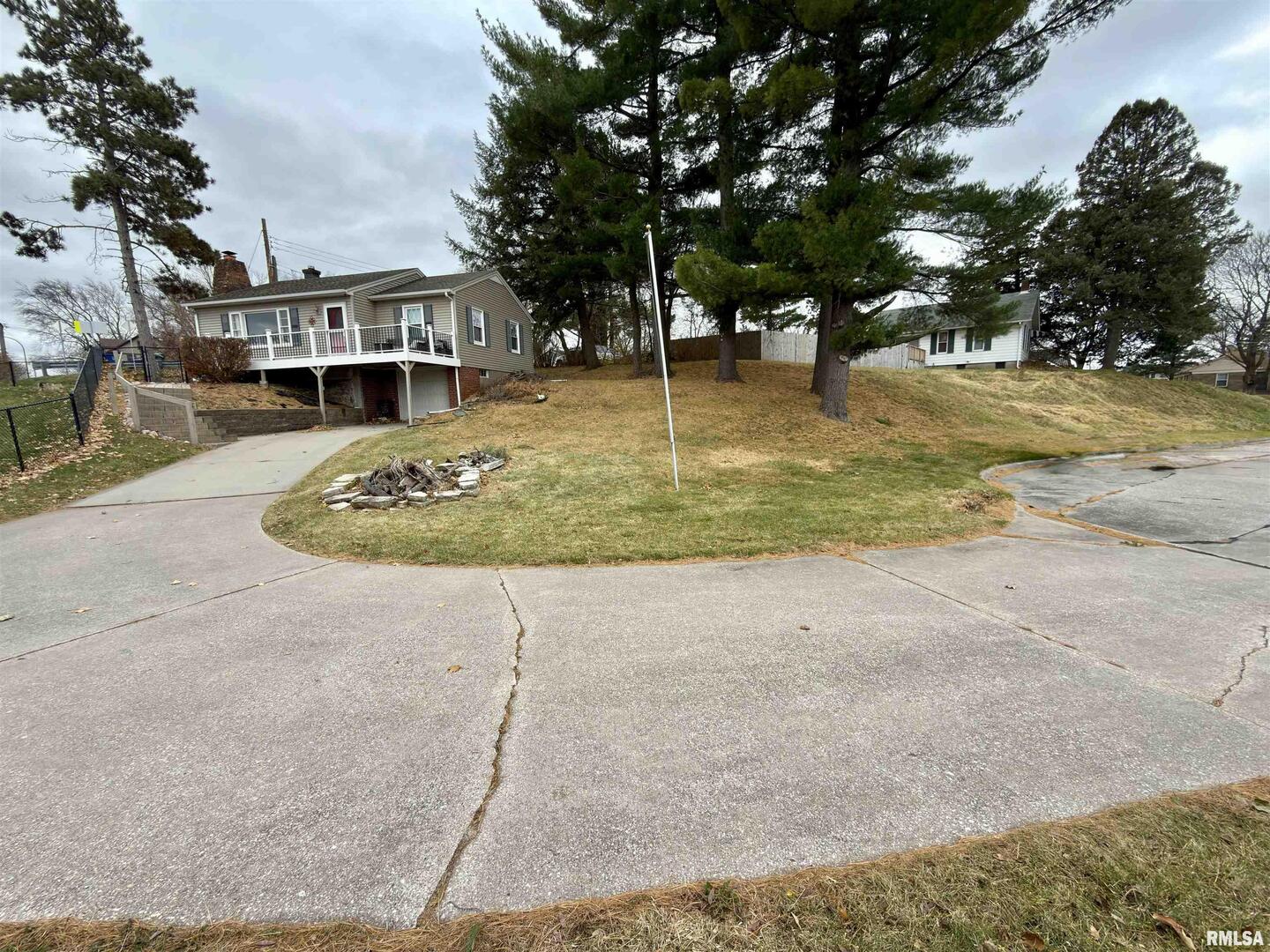 2003 19th Street Moline, IL 61265 - Photo 35 of 39 a view of a playground with basketball court