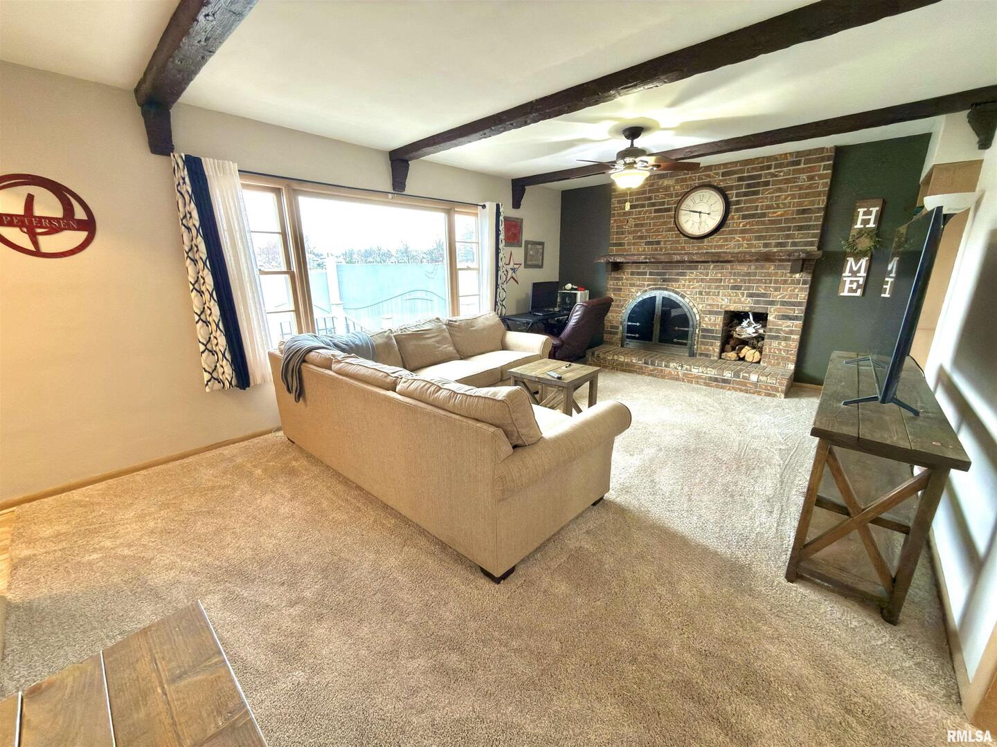 2003 19th Street Moline, IL 61265 - Photo 10 of 39 a living room with furniture and a large window