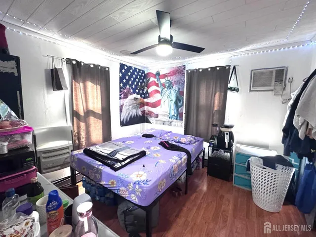 a bed room with a bed and a couch