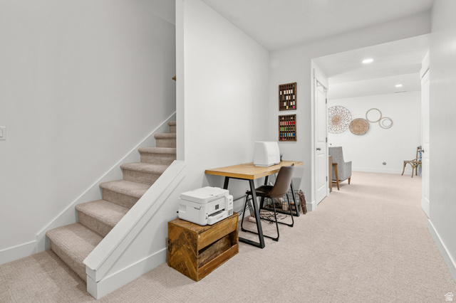 2706 West Maple Street, Unit 285 Mapleton, UT 84664 - Photo 24 of 36 Carpeted staircase with white trim, leading to an upper level