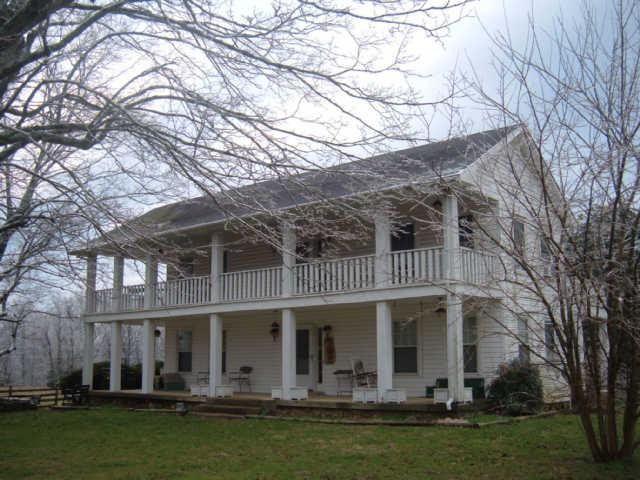 1550 Liberty Road Charlotte, TN 37036 - Photo 1 of 14 Gorgeous 2 story colonial on 21 acres.