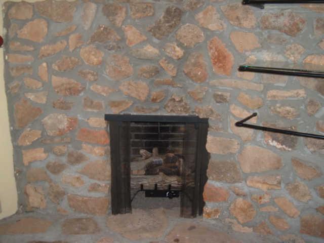 1550 Liberty Road Charlotte, TN 37036 - Photo 14 of 14 Unique stone fireplace in upstairs bedroom.