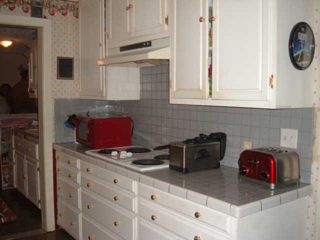1550 Liberty Road Charlotte, TN 37036 - Photo 10 of 14 Fully equipped kitchen includes triple sink on one side & antique sink on the other side.
