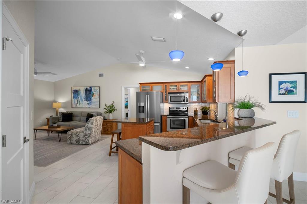 10249 Boca Circle Naples, FL 34109 - Photo 9 of 50