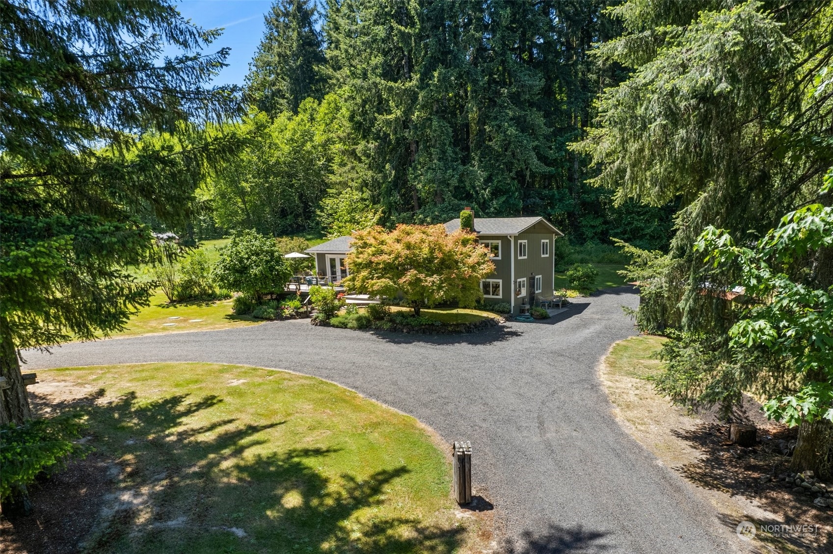 1031 Bunker Creek Road Chehalis, WA 98532 - Photo 34 of 36 a view of a swimming pool with a yard