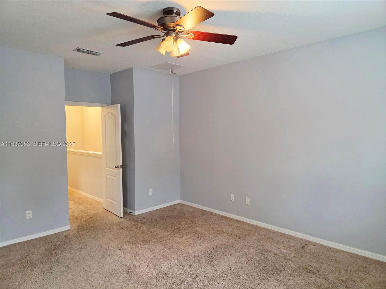 9181 Shepton Street, Unit 9181 Orlando, FL 32825 - Photo 14 of 41 a view of an empty room
