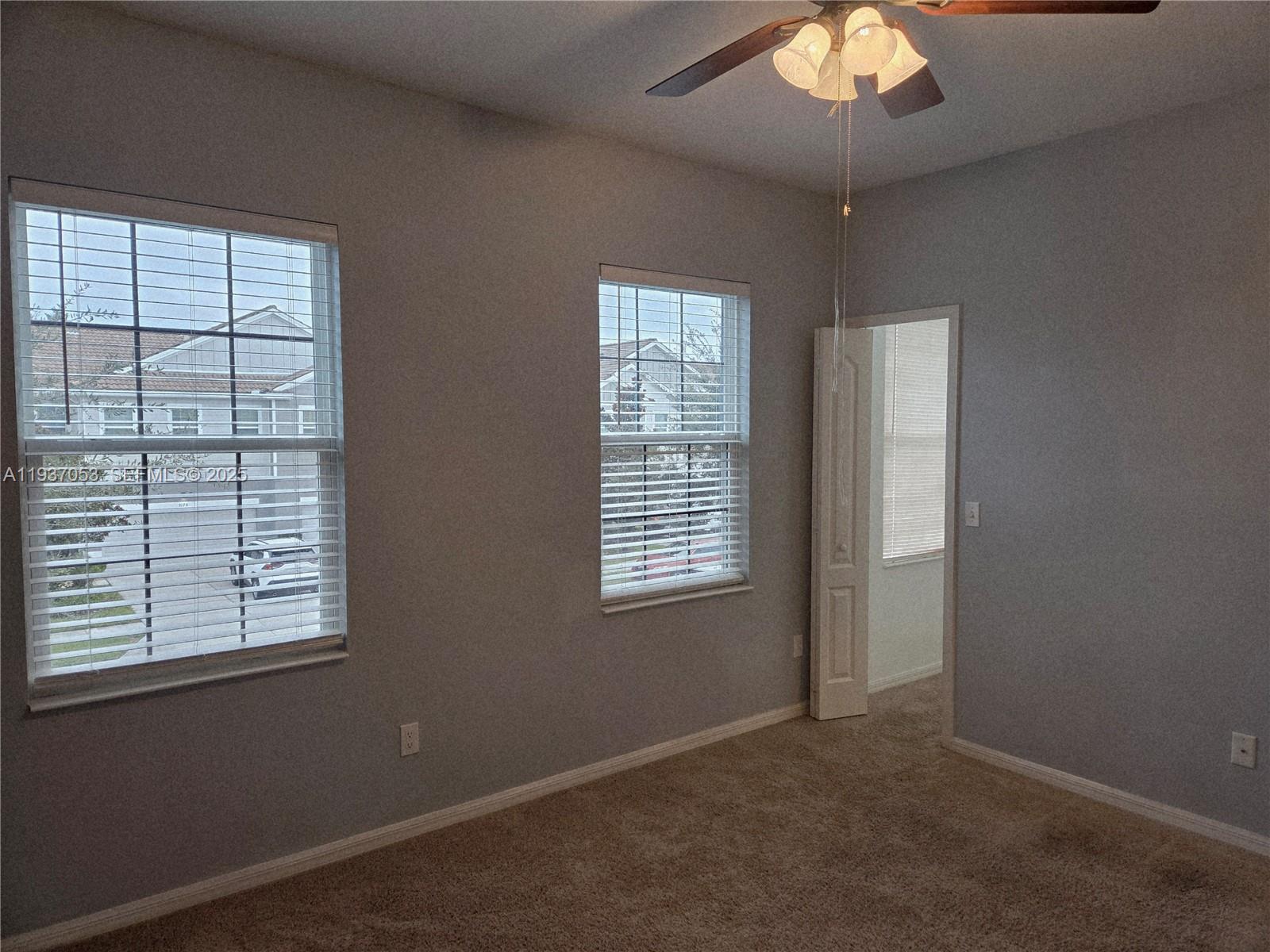 9181 Shepton Street, Unit 9181 Orlando, FL 32825 - Photo 35 of 41 an empty room with a window