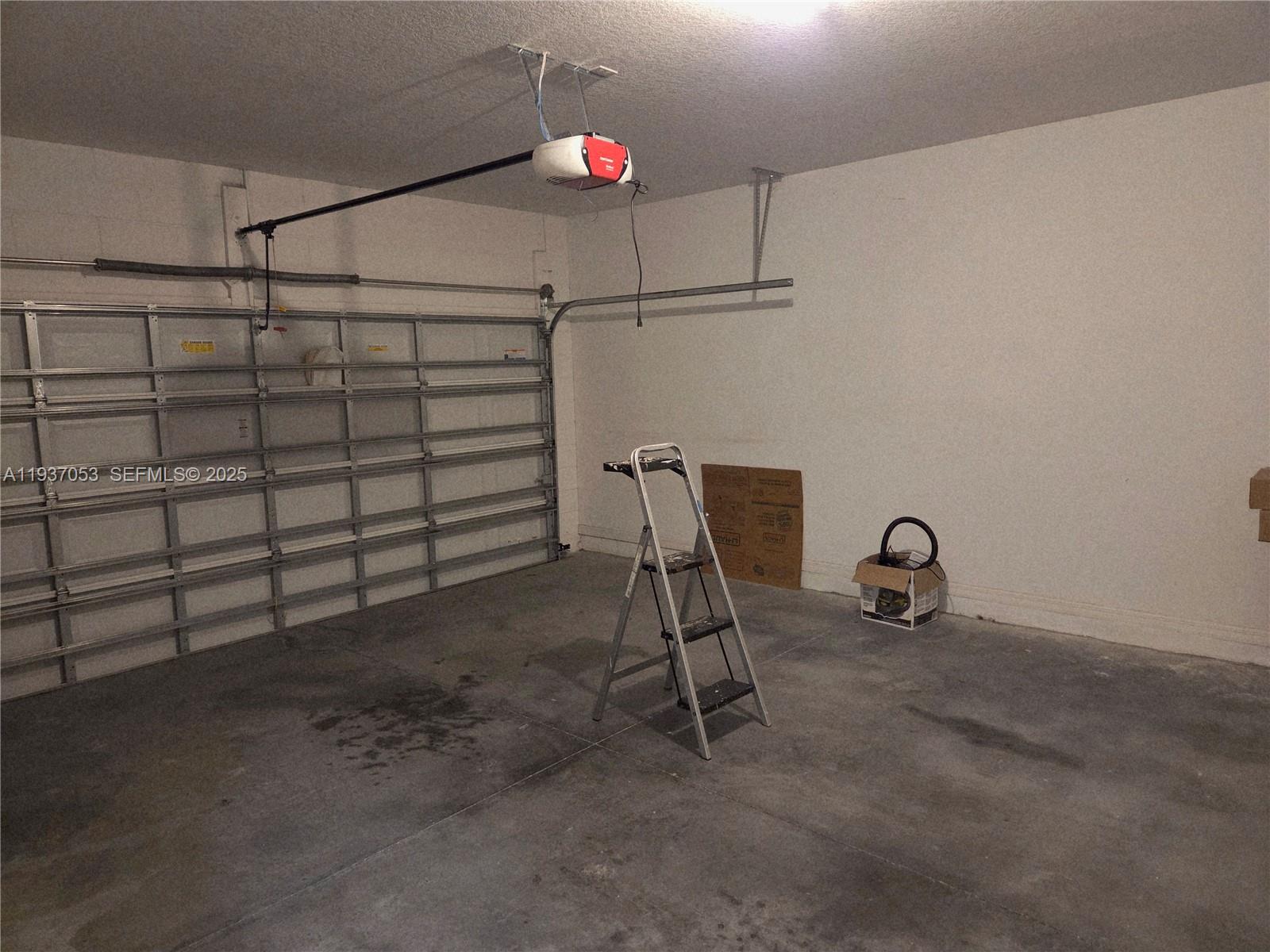 9181 Shepton Street, Unit 9181 Orlando, FL 32825 - Photo 39 of 41 a view of a room with racks on the wall