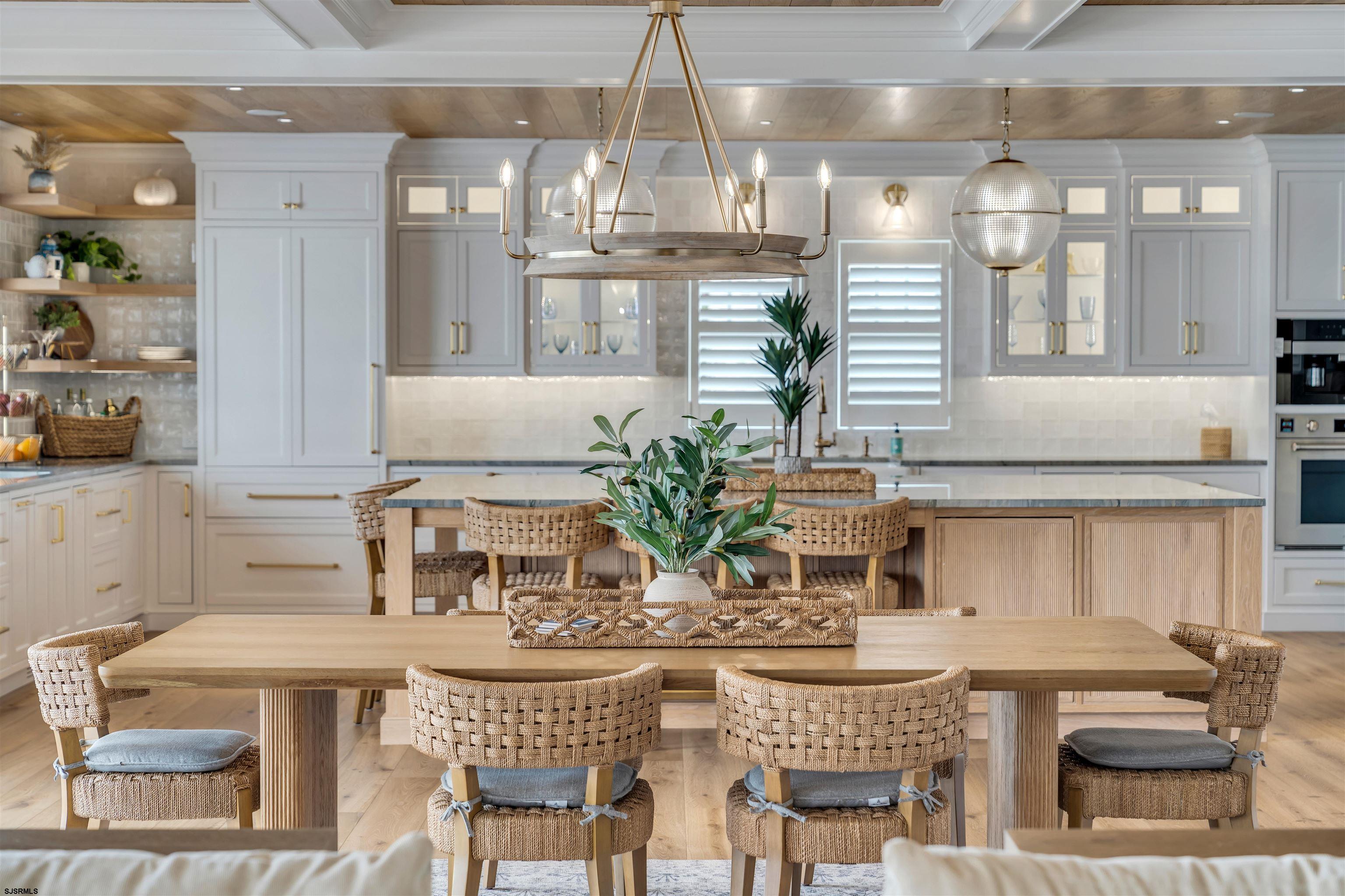 55 Walnut Road Ocean City, NJ 08226 - Photo 20 of 72 a kitchen with a table and chairs