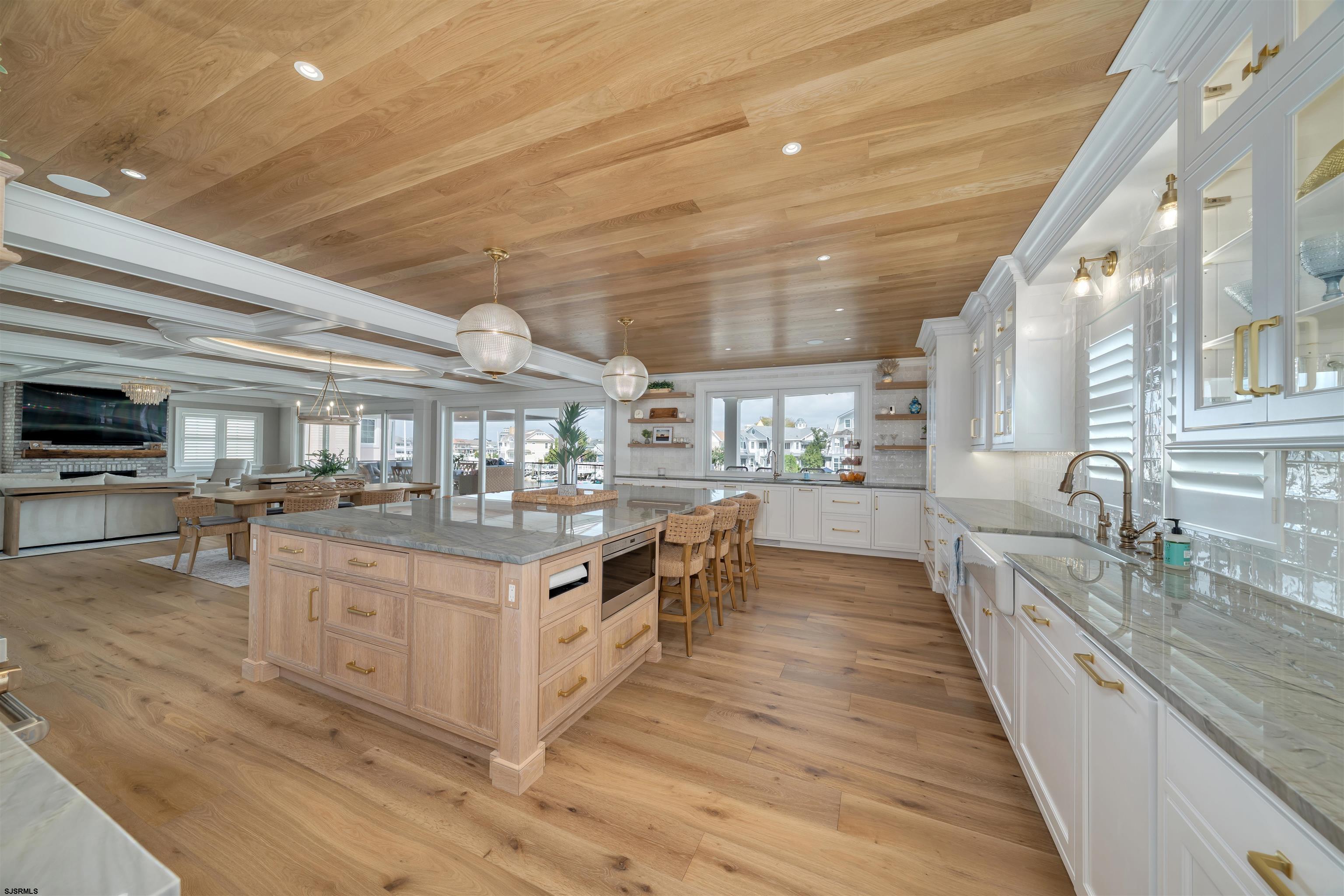 55 Walnut Road Ocean City, NJ 08226 - Photo 30 of 72 a large kitchen with stainless steel appliances granite countertop a stove and large cabinets