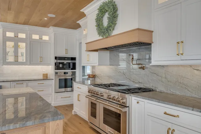 a living room with furniture and windows