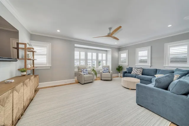 a front view of a house with garden and porch