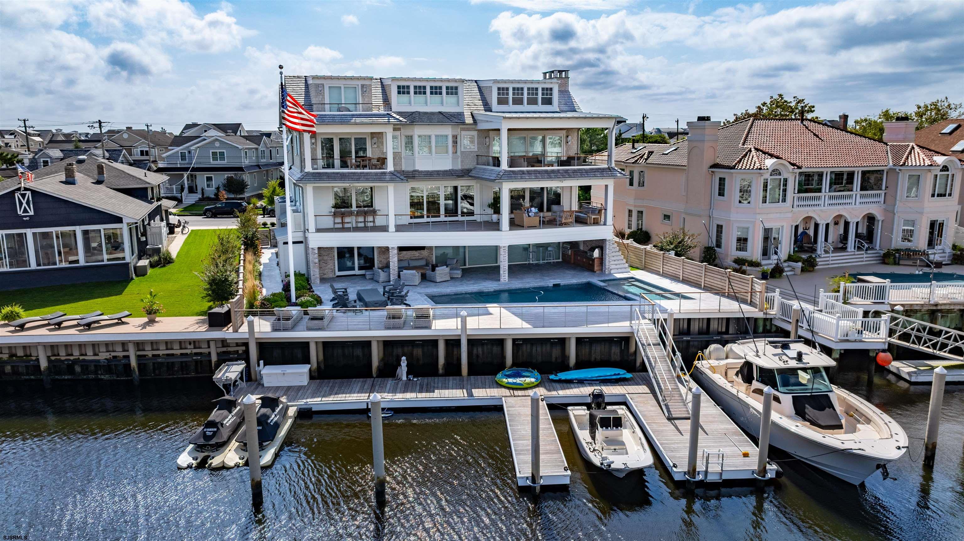 55 Walnut Road Ocean City, NJ 08226 - Photo 61 of 72 a view of a lake with roof deck