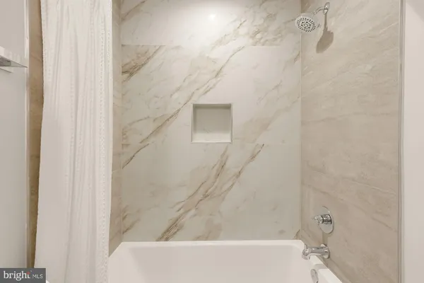 a bathroom with a bathtub