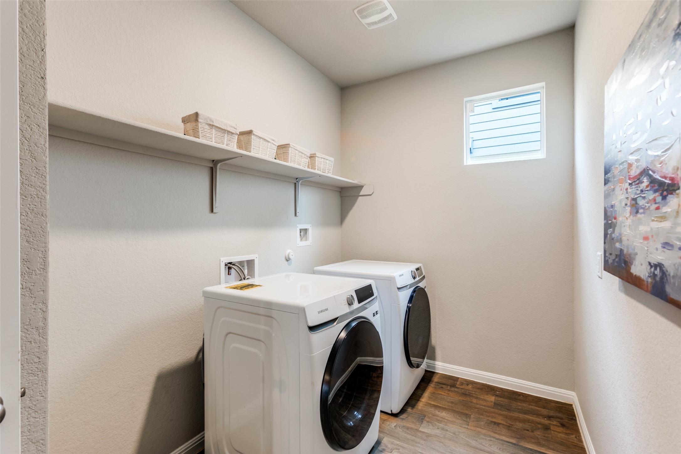 111 Rainmaker Cove Bastrop, TX 78602 - Photo 18 of 36 a utility room with dryer and washer