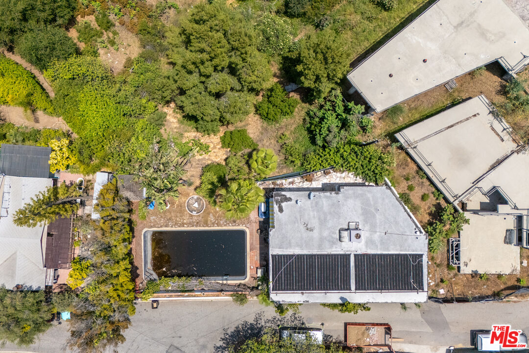 1830 Bel Air Road Los Angeles, CA 90077 - Photo 4 of 9 an aerial view of a house with a yard