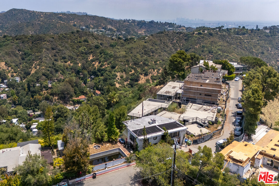 1830 Bel Air Road Los Angeles, CA 90077 - Photo 6 of 9 an aerial view of a house with a yard