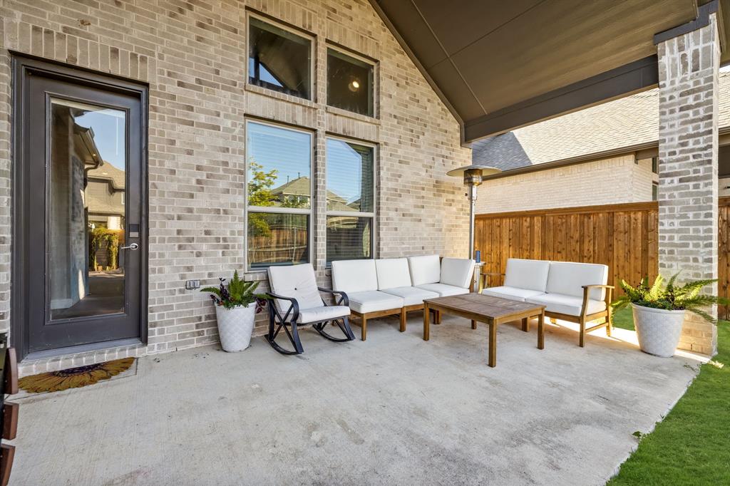 2270 English Ivy Road Frisco, TX 75033 - Photo 29 of 39 a building outdoor space with patio furniture and potted plants