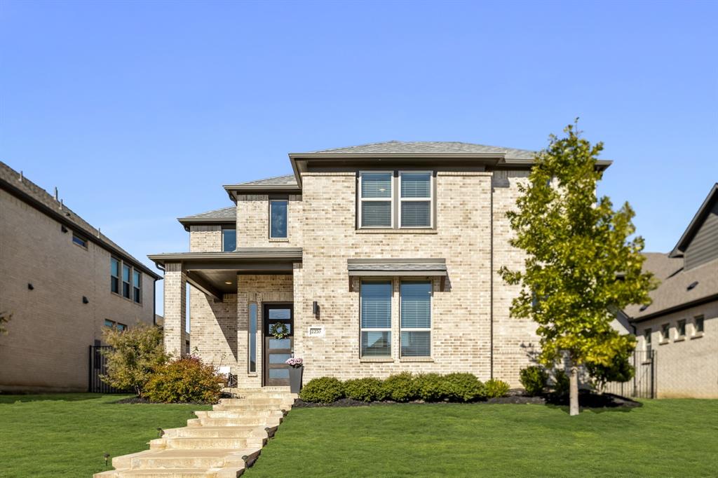 2270 English Ivy Road Frisco, TX 75033 - Photo 31 of 39 front view of a house with a yard