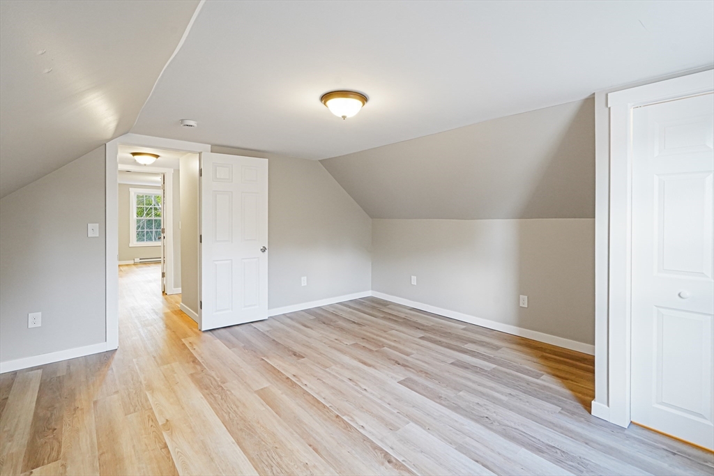 72 Main Street Pepperell, MA 01463 - Photo 15 of 26 a view of empty room with wooden floor