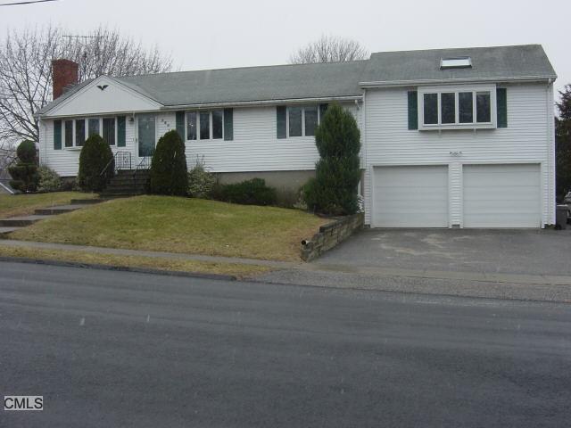 285 Post Oak Road Stratford, CT 06614 - Photo 1 of 1 a front view of a house with a yard