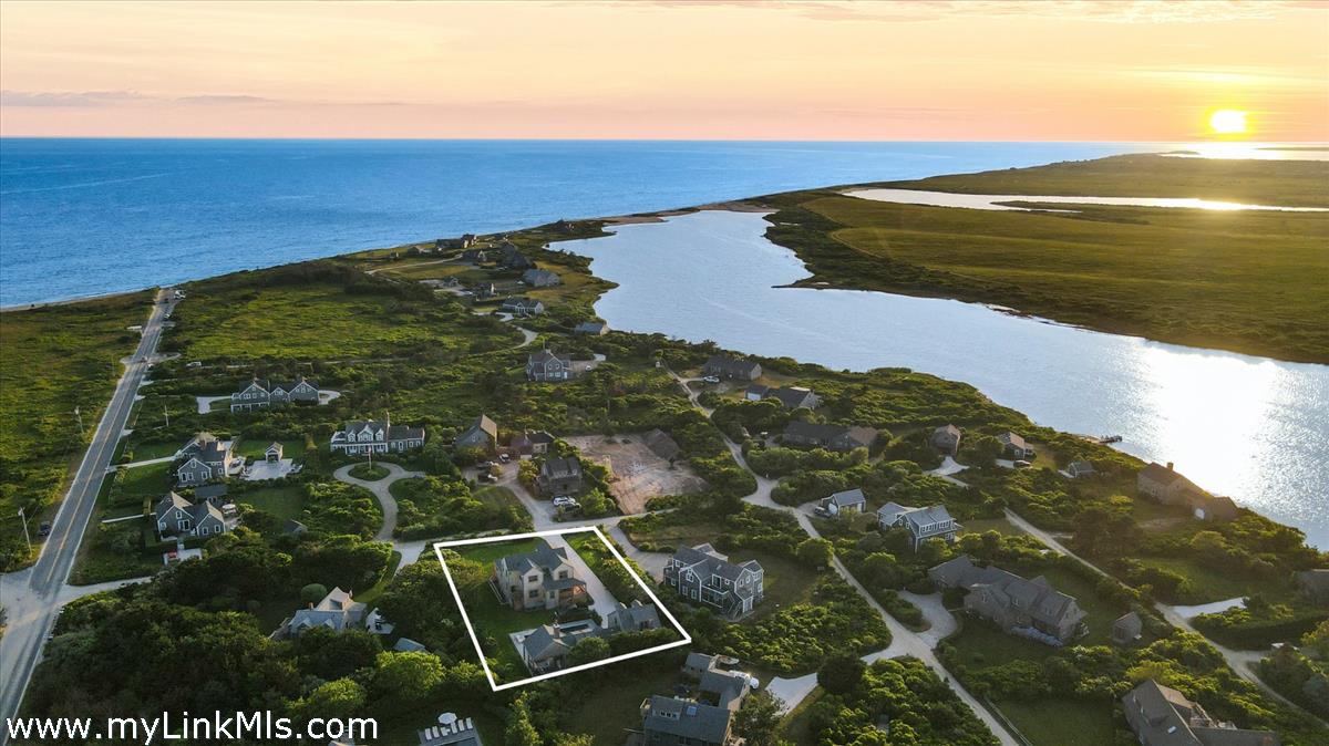 3 Tautemo Way Nantucket, MA 02554 - Photo 2 of 57 a view of ocean from a balcony