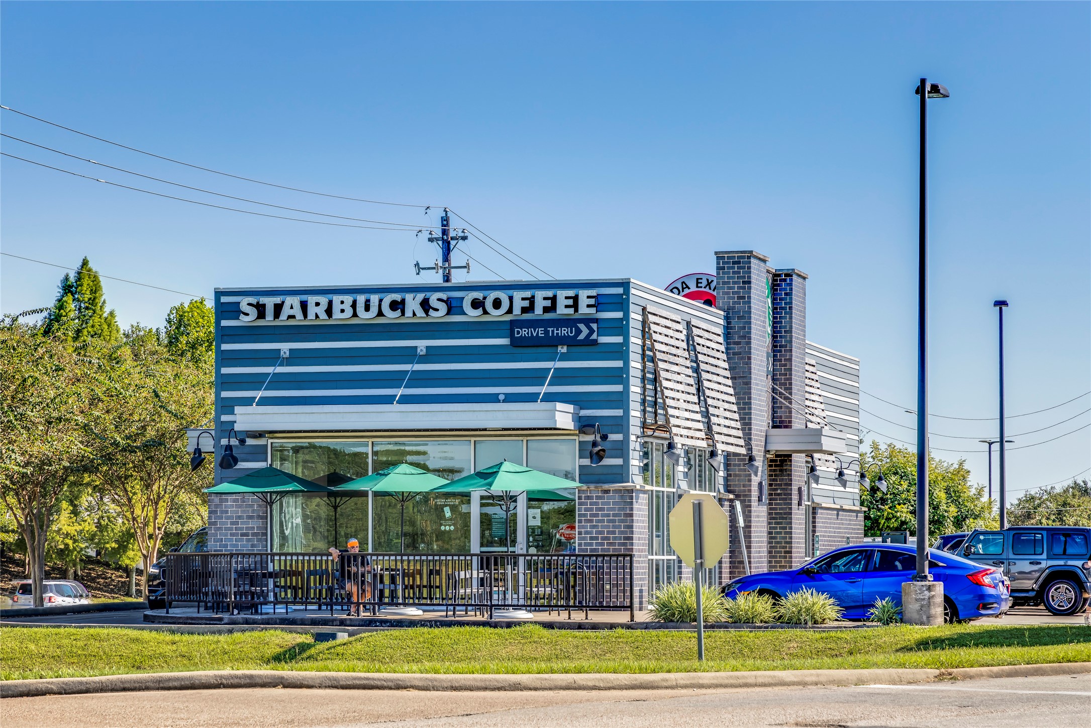 224 Amy Street Angleton, TX 77515 - Photo 20 of 34 a view of a house with a porch
