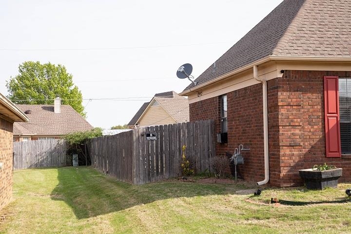 6736 Olivia Forest Road Memphis, TN 38141 - Photo 12 of 18 front view of a house with a yard