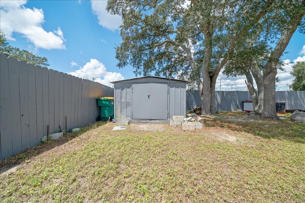 4721 Southwest 142nd Place Road Ocala, FL 34473 - Photo 24 of 25 a view of backyard of house