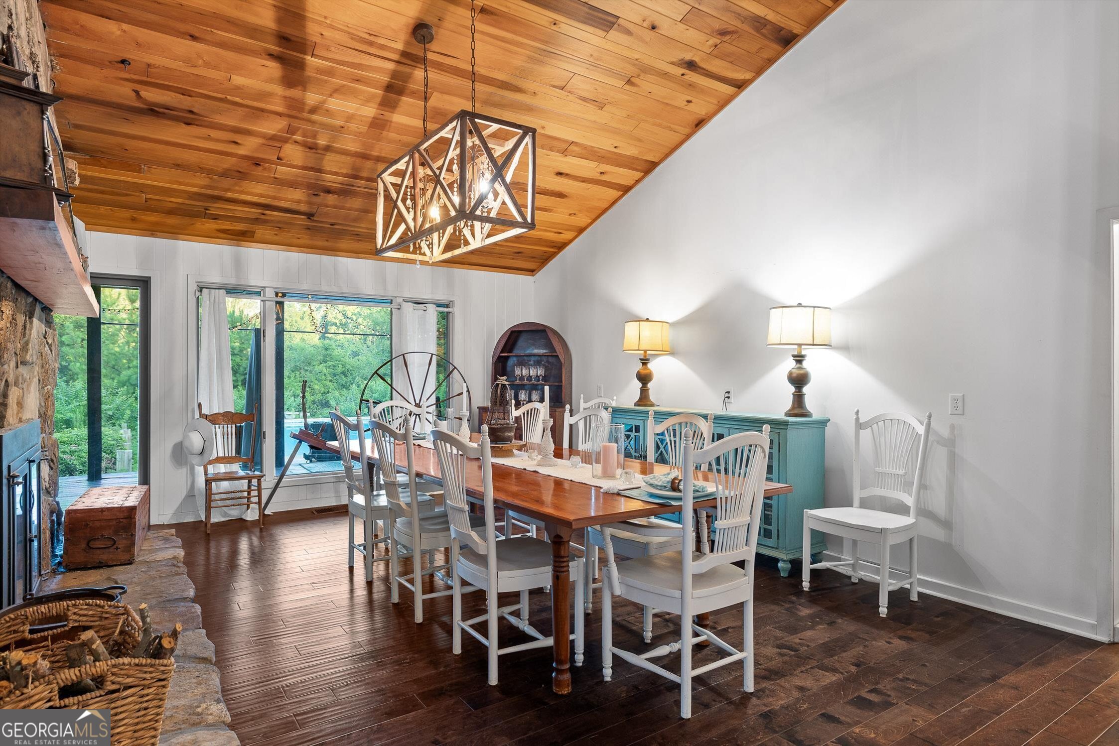 657 Brock Road Chickamauga, GA 30707 - Photo 15 of 51 Stay warm and cozy with the floor to ceiling double sided rock fireplace that serves both Living Room and Dining Room