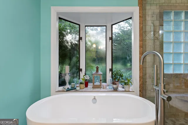 a view of a swimming pool with a yard